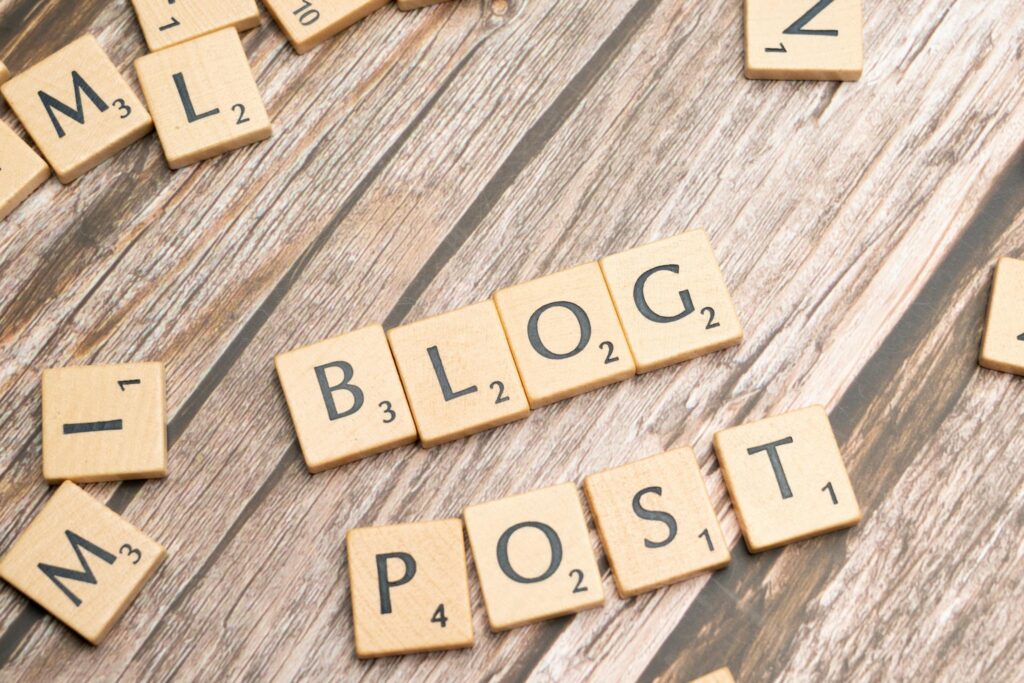 Maximizing Your Blog’s Reach: SEO Tips for Bloggers Wooden letter tiles spelling 'Blog Post' on a wooden background, ideal for online media concepts.